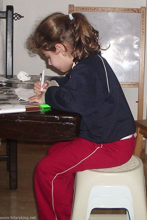 Child sitting drawing.jpg
